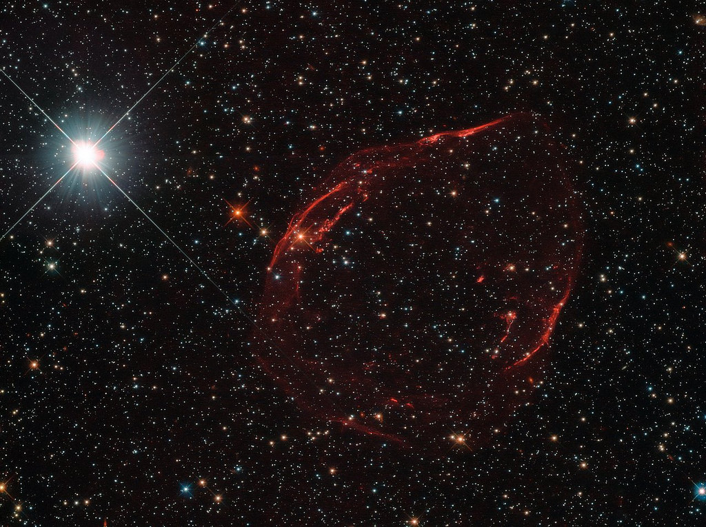 Several thousand years ago, a star some 160,000 light-years away from us exploded as a Type Ia supernova. The aftermath of this energetic detonation is shown in this image from the NASA/ESA Hubble Space Telescope. The remnant has been designated DEM L71. Credit: gsfc/Flickr, CC BY 2.0