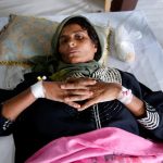 Cholera-infected patient lies on a bed while being treated at a cholera treatment center in the Red Sea port city of Hodeidah, Yemen