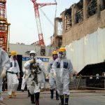 IAEA experts, charged with reviewing Japan’s plans for the Fukushima nuclear facility, leave Unit 4 in 2013. IAEA/Flickr, CC BY 4.0