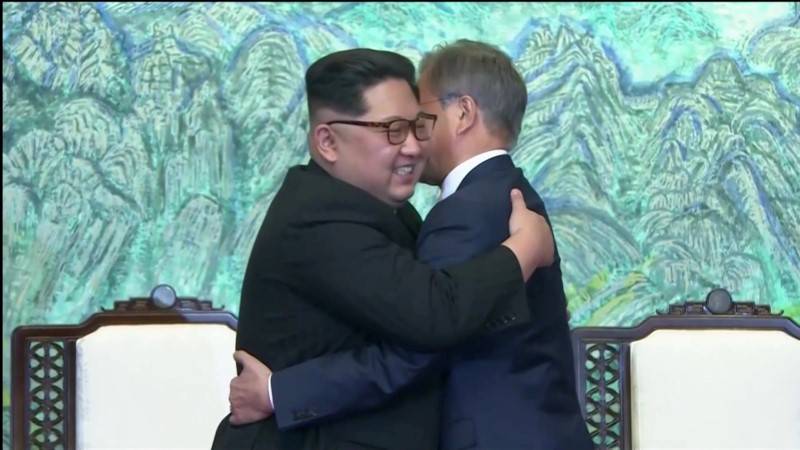 South Korean President Moon Jae-in and North Korean leader Kim Jong Un embrace after signing agreements during the inter-Korean summit at the truce village of Panmunjom, in this still frame taken from video, South Korea April 27, 2018. Credit: Host Broadcaster via Reuters TV