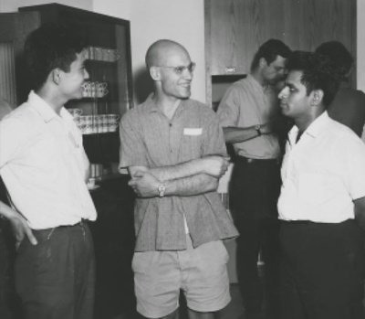 Left to right: Masayoshi Miyanishi, Alexander Grothendieck and Shreeram Abhyankar, with Michael Artin in the background, at Montreal 1970. Credit: Konrad Jacobs/The Mathematisches Forschungsinstitut Oberwolfach