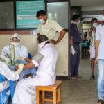 Kozhikode: Doctors and patients wear safety masks as a precautionary measure after the 'Nipah' virus outbreak, at a Medical college, in Kozhikode, on Wednesday. Credit: PTI