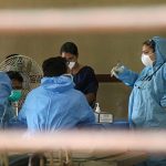 Hospital staff wears safety masks as a precautionary measure at the Kozhikode Medical College after the 'Nipah' virus outbreak, in Kozhikode, on Tuesday. Credit: PTI