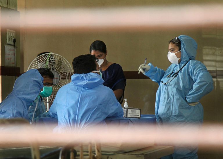 Hospital staff wears safety masks as a precautionary measure at the Kozhikode Medical College after the 'Nipah' virus outbreak, in Kozhikode, on Tuesday. Credit: PTI