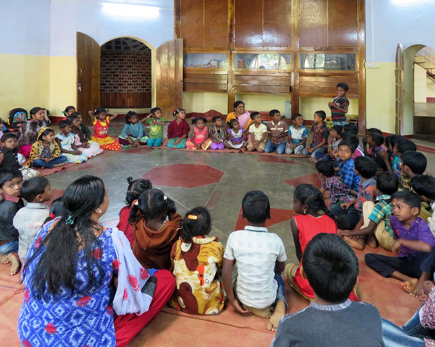 The students sing Adivasi songs during their morning assembly. Credit: Priti David/People's Archive of Rural India