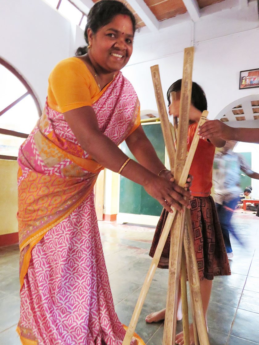 Students use sticks found in the forest for measurements in maths class. Credit: Priti David/People's Archive of Rural India
