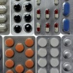File photo illustration shot in Ljubljana of pharmaceutical tablets and capsules in foil strips