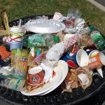 Single-use plastic items in a trash can. Credit: kevinkrejci/Flickr, CC BY 2.0