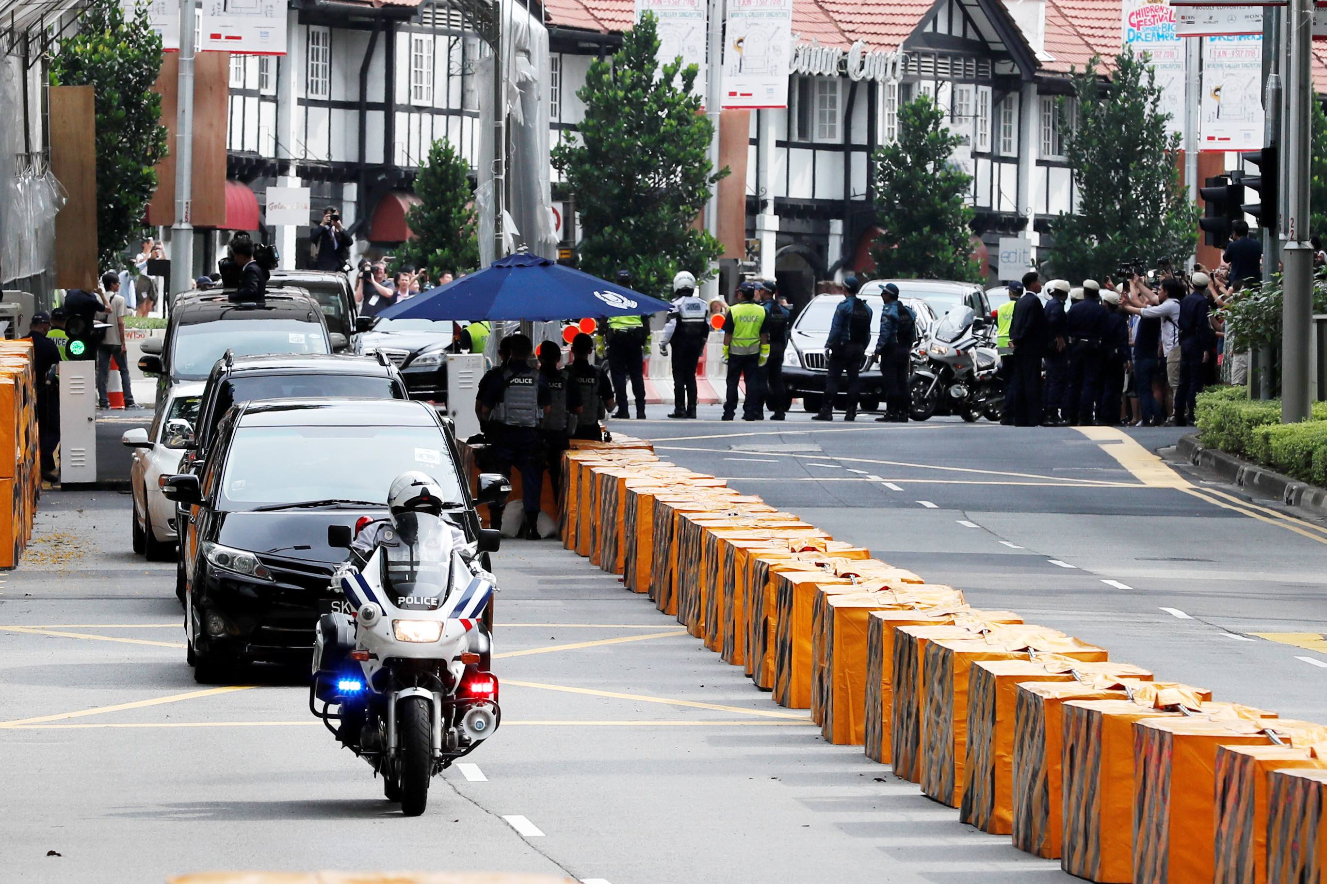 A motorcade believed to be carrying North Korea's leader Kim Jong Un travels past in Singapore June 10, 2018, ahead of the summit between the North Korean leader and U.S. President Donald Trump. Credit: Reuters/Tyrone Siu