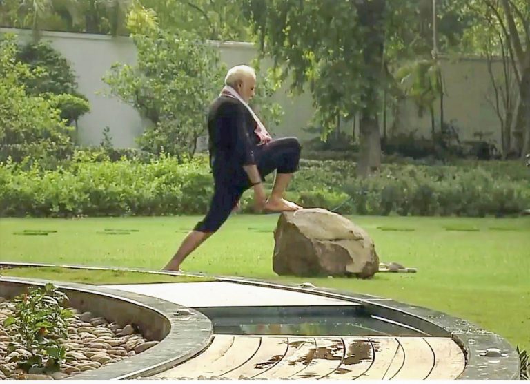 PM does yoga exercises