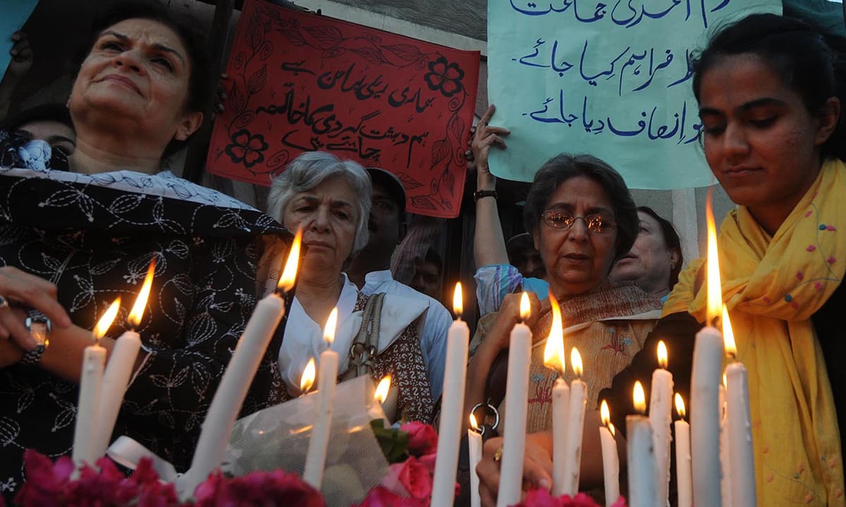 Civil society members hold a peace vigil for the Ahmadi community outside an Ahmadi prayer hall attacked in Lahore in 2010. Credit: M. Arif, White Star