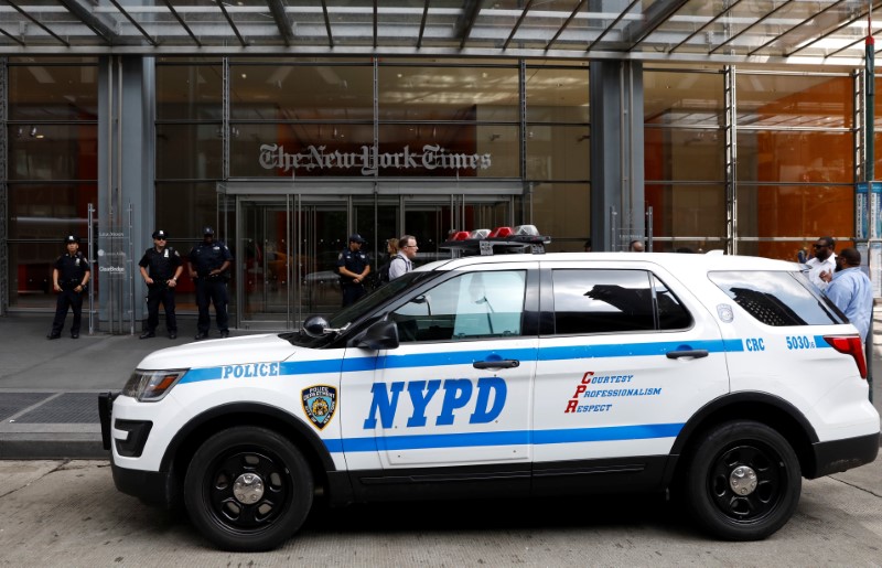 New York Police officers are seen deployed outside the New York Times building following a fatal shooting at a Maryland newspaper, in New York City, US, June 28, 2018. Credit: Reuters/Brendan McDermid