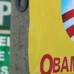 A sign on an insurance store advertises Obamacare in San Ysidro