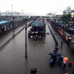 Thane railway station was completely flooded, bringing central Railway trains to a halt after heavy rains in Mumbai recently. Credit: PTI