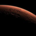 This computer-generated view depicts part of Mars at the boundary between darkness and daylight, with an area including Gale Crater beginning to catch morning light