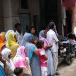 AIIMS students raising awareness about mosquito-borne illnesses in a Delhi slum. Credit: Wikimedia Commons