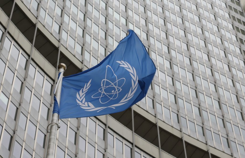 The flag of the International Atomic Energy Agency (IAEA) flies in front of its headquarters in Vienna, Austria, January 15, 2016. Credits: Reuters/Leonhard Foeger