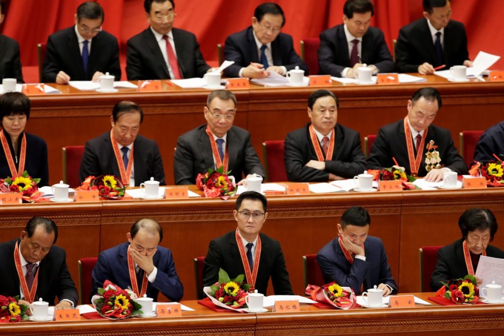 Tencent's Chief Executive Officer Pony Ma, Alibaba's Executive Chairman Jack Ma and others attend an event marking the 40th anniversary of China's reform and opening up at the Great Hall of the People in Beijing, China December 18, 2018. Credit: REUTERS/Jason Lee