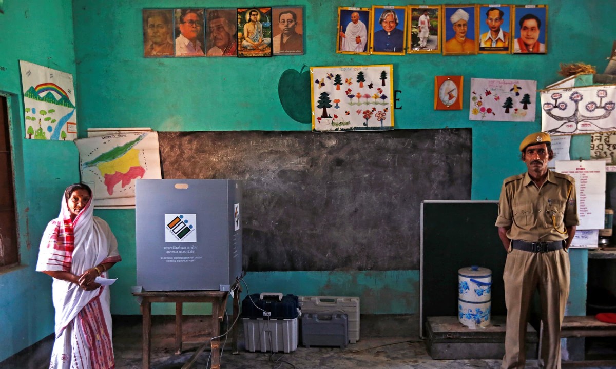 A woman leaves after casting her vote at a polling station during the first phase of general election in Majuli, a large river island in the Brahmaputra river, in the northeastern Indian state of Assam, India April 11, 2019. Credit: Reuters