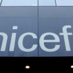 FILE PHOTO: A UNICEF logo is pictured outside their offices in Geneva, Switzerland, January 30, 2017. Credit: REUTERS/Denis Balibouse