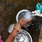 a-woman-collects-drinking-water-in-odisha_rural-sanitation_gram-vikas-1024x684