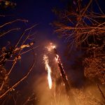 A tract of the Amazon jungle burns as it is cleared by loggers and farmers in Porto Velho