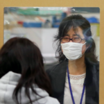 Representative image of Japanese government workers following social distancing norms. Photo: Reuters