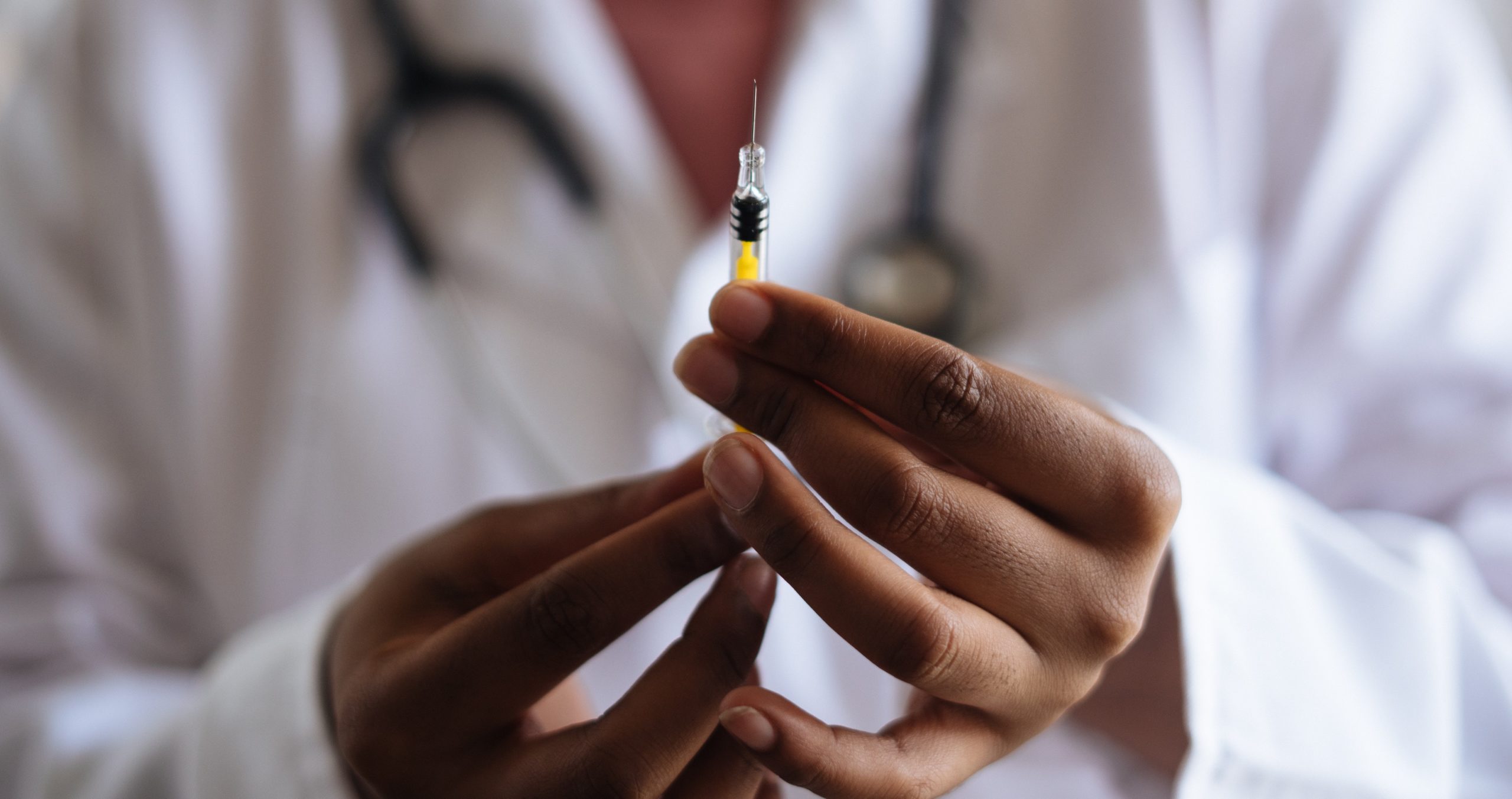person-holding-injection-3825529