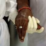 Medical workers treat patients infected with the coronavirus disease (COVID0-19) at a hospital in New Delhi