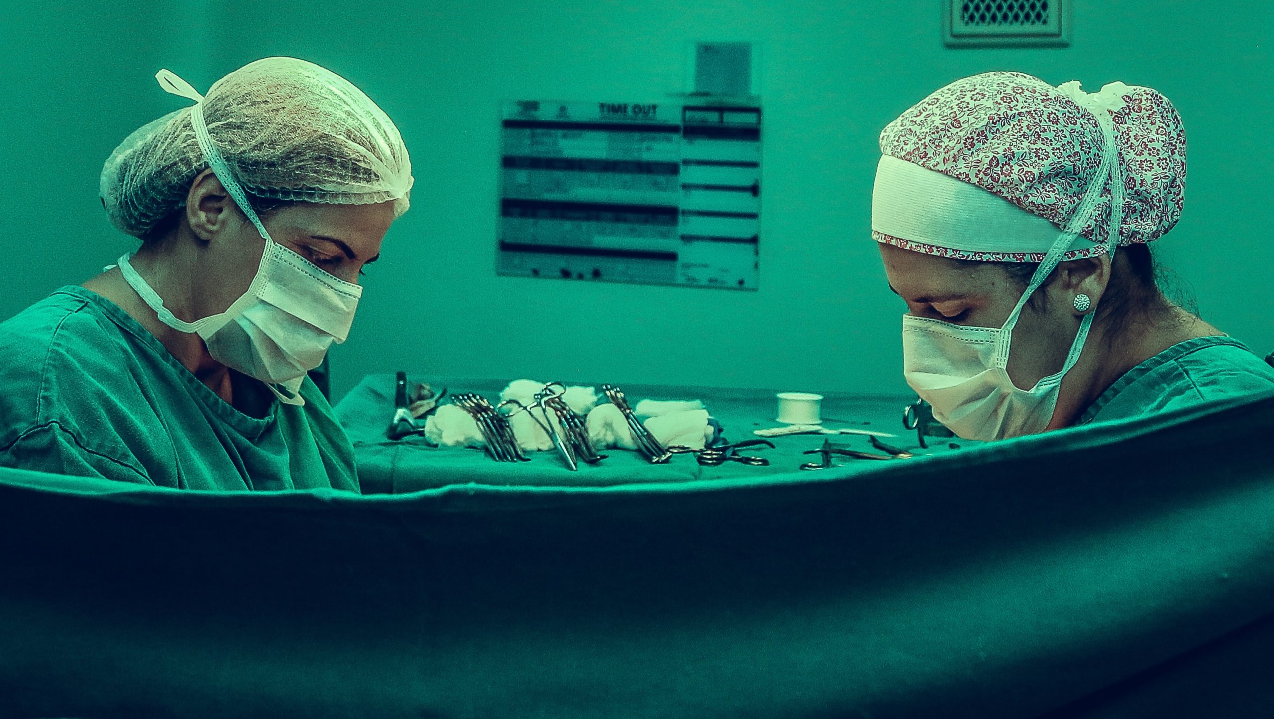two-person-doing-surgery-inside-room-1250655
