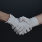 people-shaking-hands-in-latex-gloves-3959482