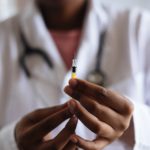 person-holding-injection-3825529