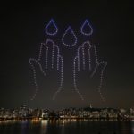 Drones fly over the Han river showing messages to support the country as measures to avoid the spread of the coronavirus disease (COVID-19) continue in Seoul