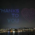 Drones fly over the Han river showing messages to support the country as measures to avoid the spread of the coronavirus disease (COVID-19) continue in Seoul