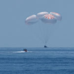 The SpaceX Crew Dragon Endeavour spacecraft is seen as it lands with NASA astronauts Robert Behnken and Douglas Hurley onboard in the Gulf of Mexico off the coast of Pensacola, Florida