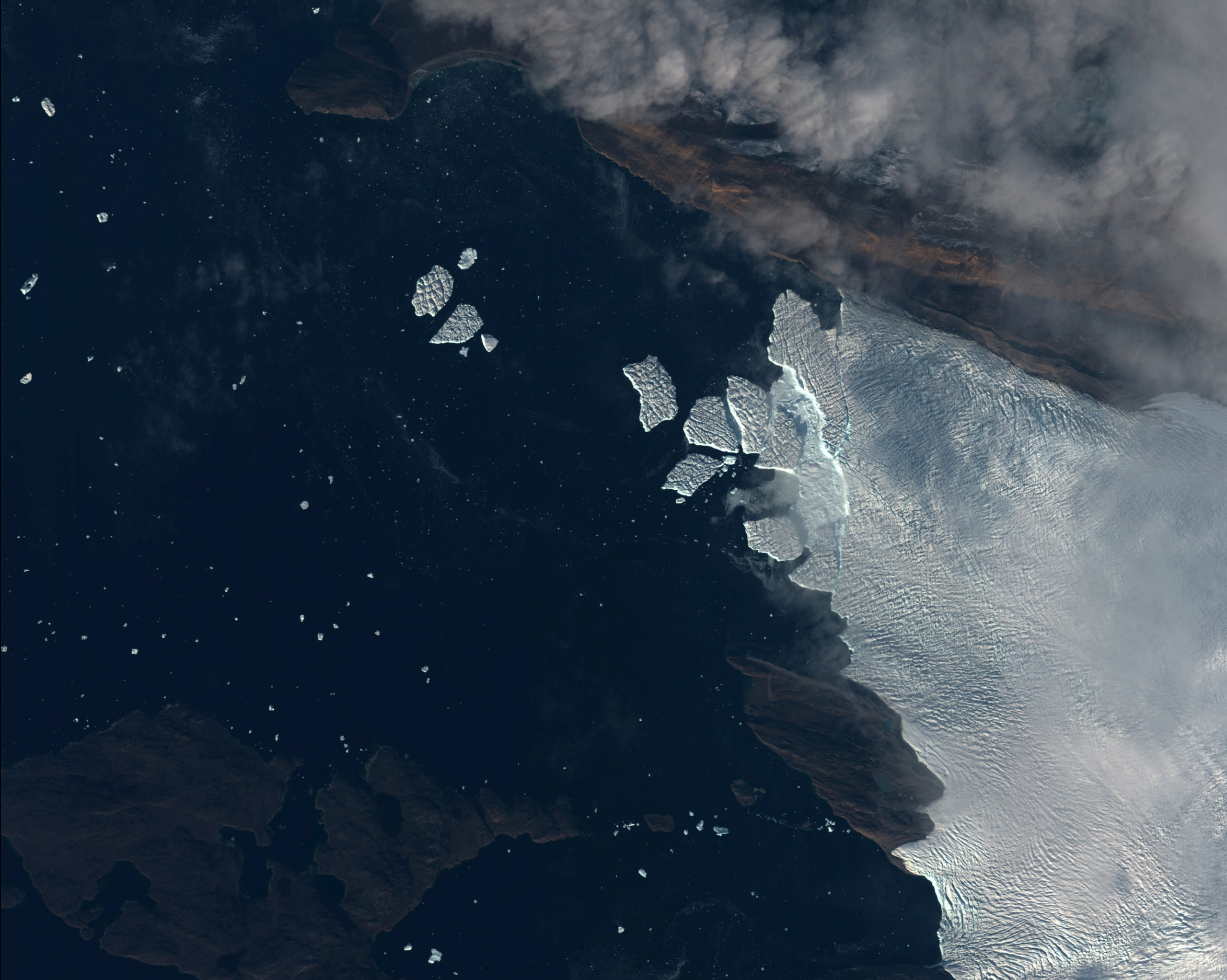 A handout satellite photo of Tracy and Heilprin glaciers