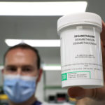 FILE PHOTO: A pharmacist displays a box of Dexamethasone at the Erasme Hospital amid the coronavirus disease (COVID-19) outbreak, in Brussels