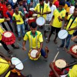 men-beat-drums