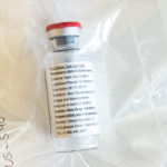 FILE PHOTO: An ampule of Gilead Sciences COVID-19 antiviral remdesivir is pictured during a news conference