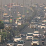 Traffic moves on a smoggy morning in New Delhi