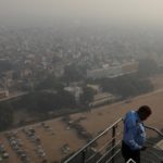 Buildings are seen shrouded in smog in New Delhi