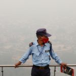 Buildings are seen shrouded in smog in New Delhi