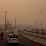 Traffic moves on a smoggy morning in New Delhi