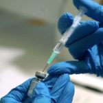 FILE PHOTO: A needle is filled from a phial of Pfizer/BioNTech COVID-19 vaccine at the Royal Victoria Infirmary in Newcastle