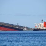 FILE PHOTO: A general view shows the bulk carrier ship MV Wakashio, belonging to a Japanese company but Panamanian-flagged, that ran aground on a reef, at Riviere des Creoles