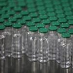 FILE PHOTO: Vials of AstraZeneca's COVISHIELD, coronavirus disease (COVID-19) vaccine, are seen before they are packaged inside a lab at Serum Institute of India, Pune