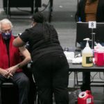 Man receives COVID-19 vaccine in New York City