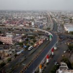 FILE PHOTO: Traffic moves along roads in Ahmedabad