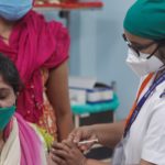 Healthcare worker receives AstraZeneca's COVISHIELD vaccine during the COVID-19 vaccination campaign at a medical centre in Mumbai