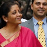 India's Finance Minister Nirmala Sitharaman (C) and Krishnamurthy Subramanian (R), chief economic adviser pose during a photo opportunity outside their office before the presentation of the federal budget in the parliament in New Delhi